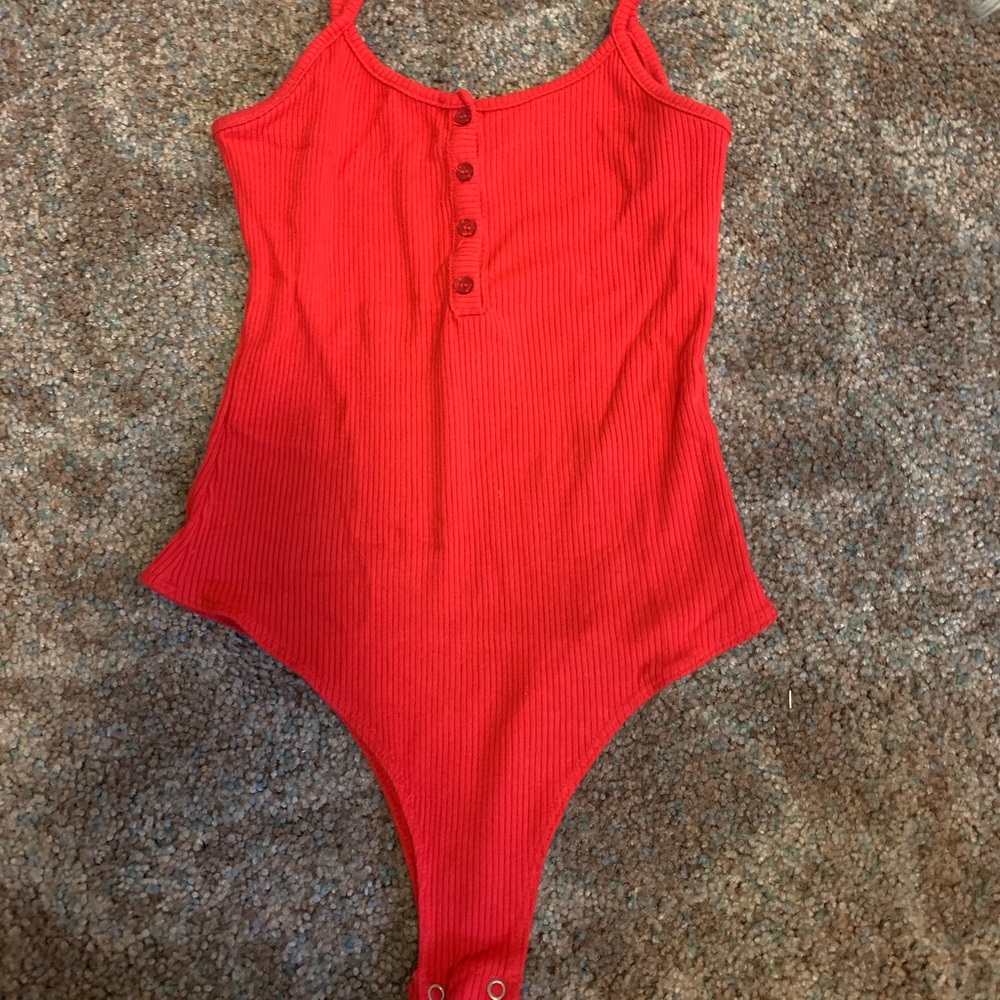 red garage body suit